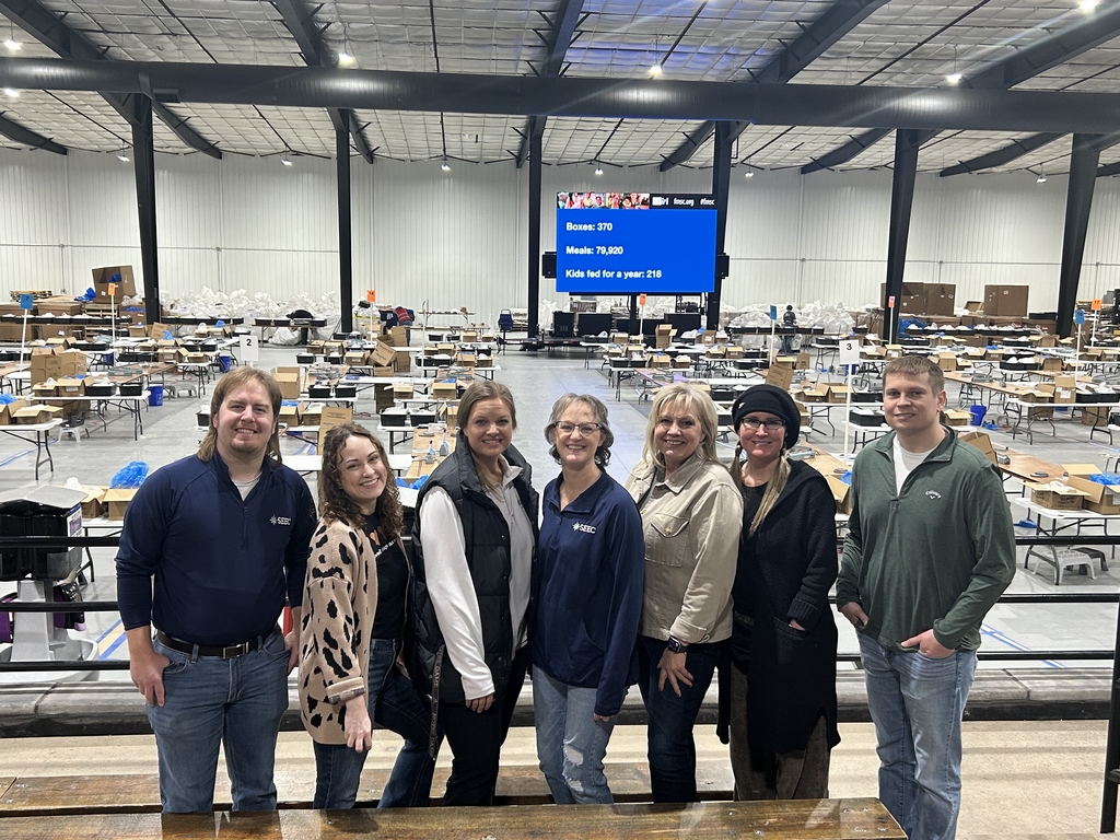 group of 7 people smiling
