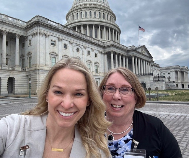 afterschool lead dawn and afterschool ambassador Lori in front of the US capitol building