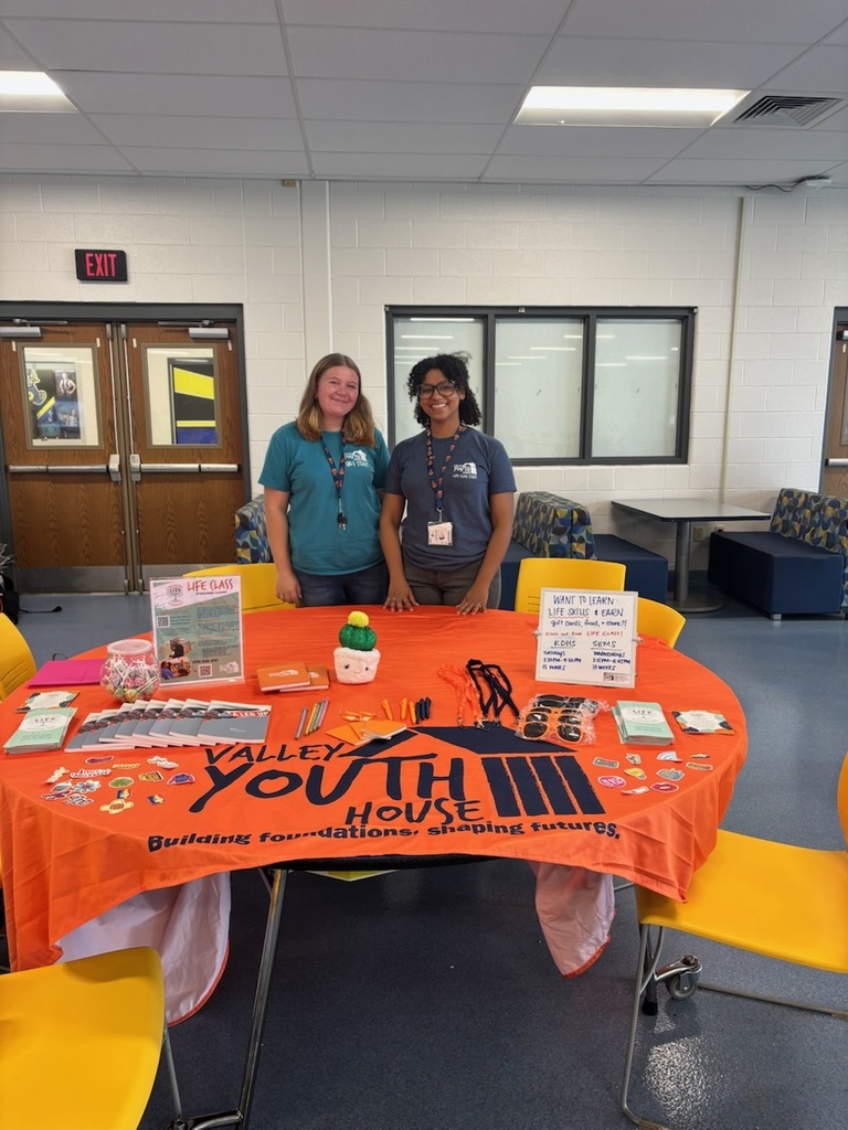 Picture of staff members from Valley Youth House attending SESD's New Family Night.