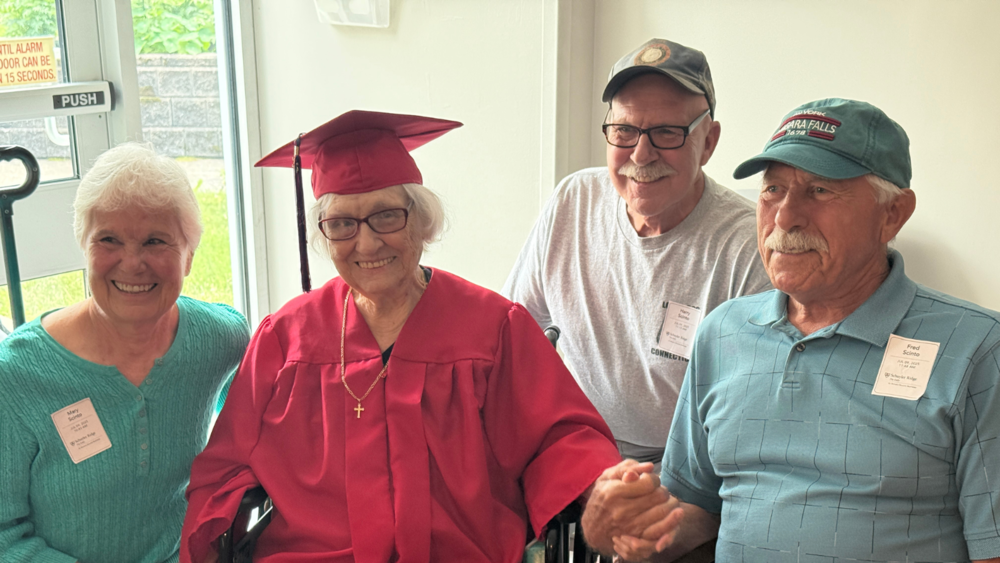 Ruth and three of her four children on her graduation day