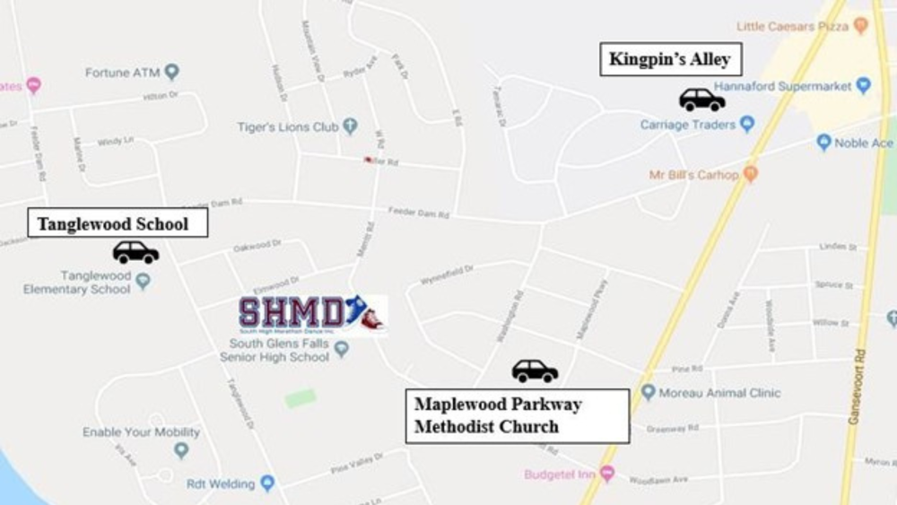 A simplified street map of South Glens Falls, NY, showing three labeled parking locations for the SHMD (South High Marathon Dance). The SHMD logo appears near the center of the map at South Glens Falls Senior High School. Three icons of cars mark parking areas: Tanglewood School on the west side of the map, Maplewood Parkway Methodist Church to the south of the high school, and Kingpin’s Alley to the northeast. Nearby landmarks shown include Tanglewood Elementary School, Hannaford Supermarket, Stewart’s Shops, Moreau Animal Clinic, and several local roads such as Feeder Dam Road, Bluebird Road, and Route 9.