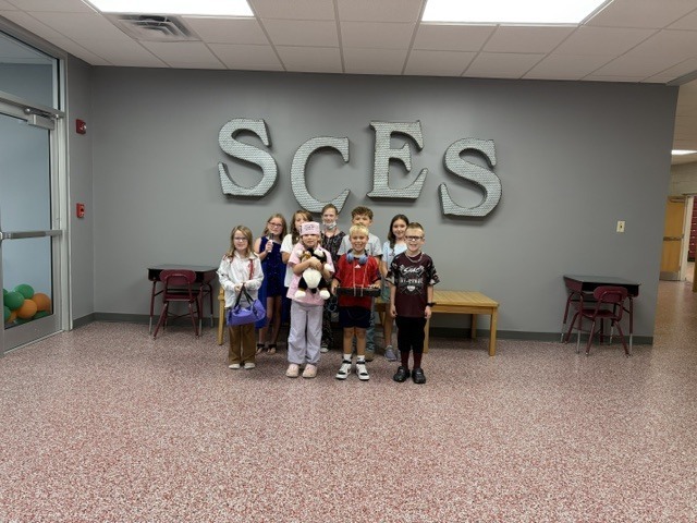 students dressed for their future careers