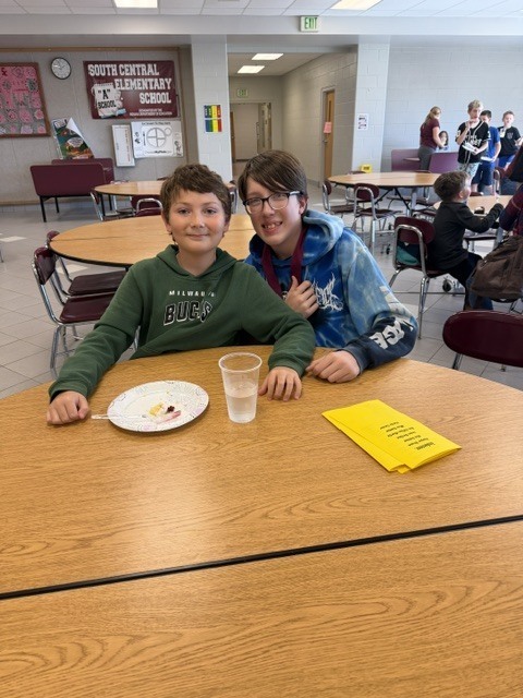 students sitting at a table