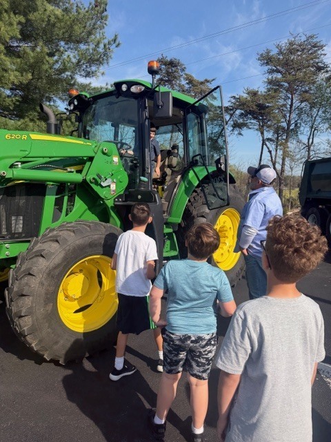 students outside a truck