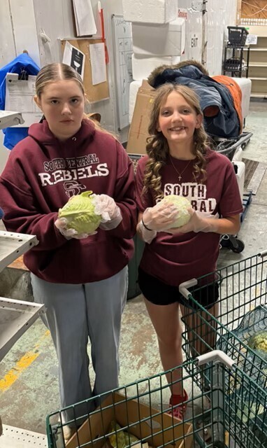 students working at food pantry