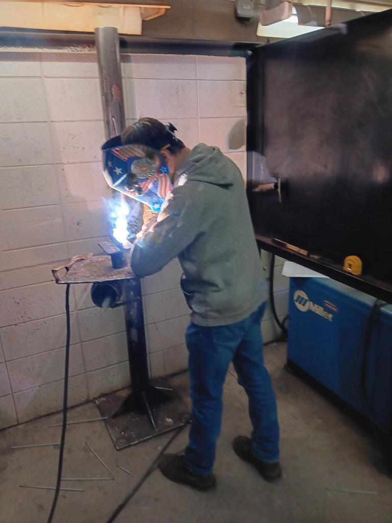 Levi Joyce (South Harrison) making a fillet weld with E7018 using SMAW