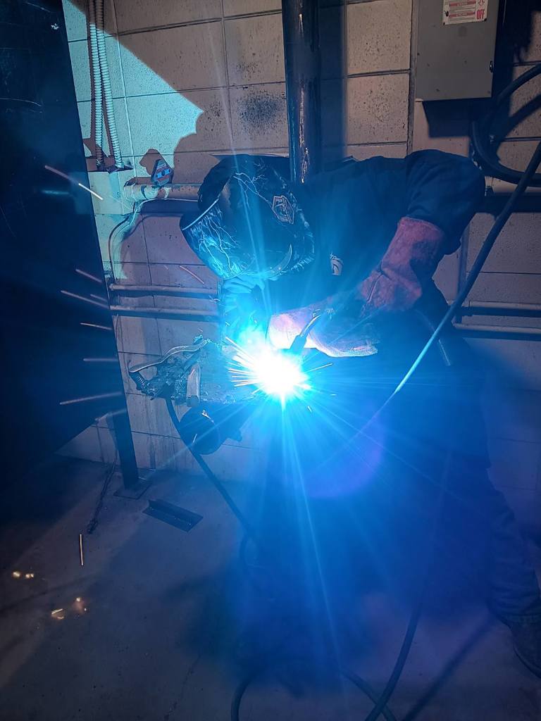 William Ellsworth (Stanberry) making a 10" long fillet weld with GMAW