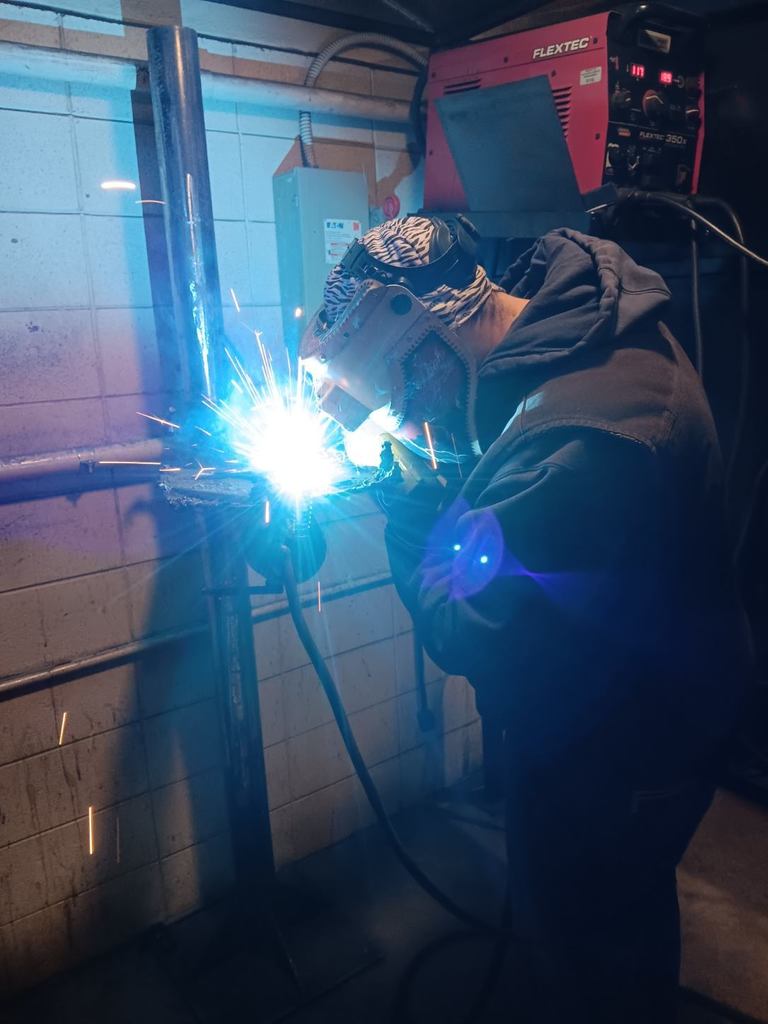 Kylan Hale (North Daviess) puts the last weld on his GMAW project