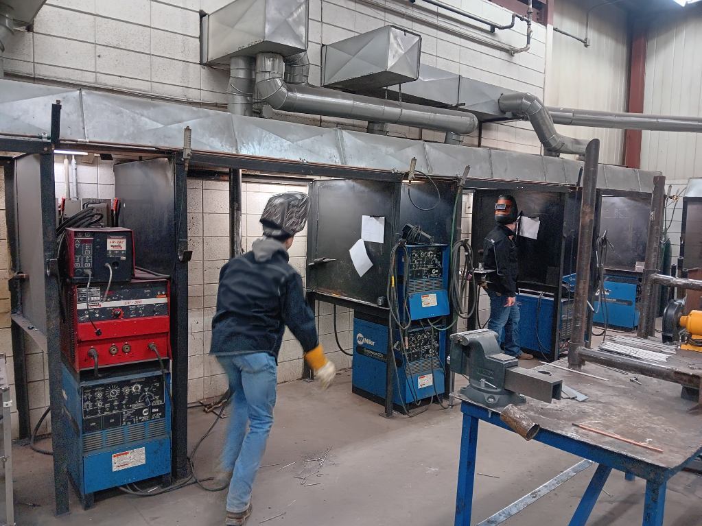 Logan Cornelison (South Harrison) on left and Kreed Taylor (Ridgeway) on right prepare to start the SMAW portion of our in-house welding competition