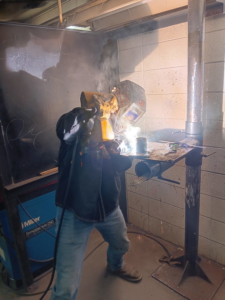 Logan Cornelison (South Harrison) works to complete his SMAW project in time 