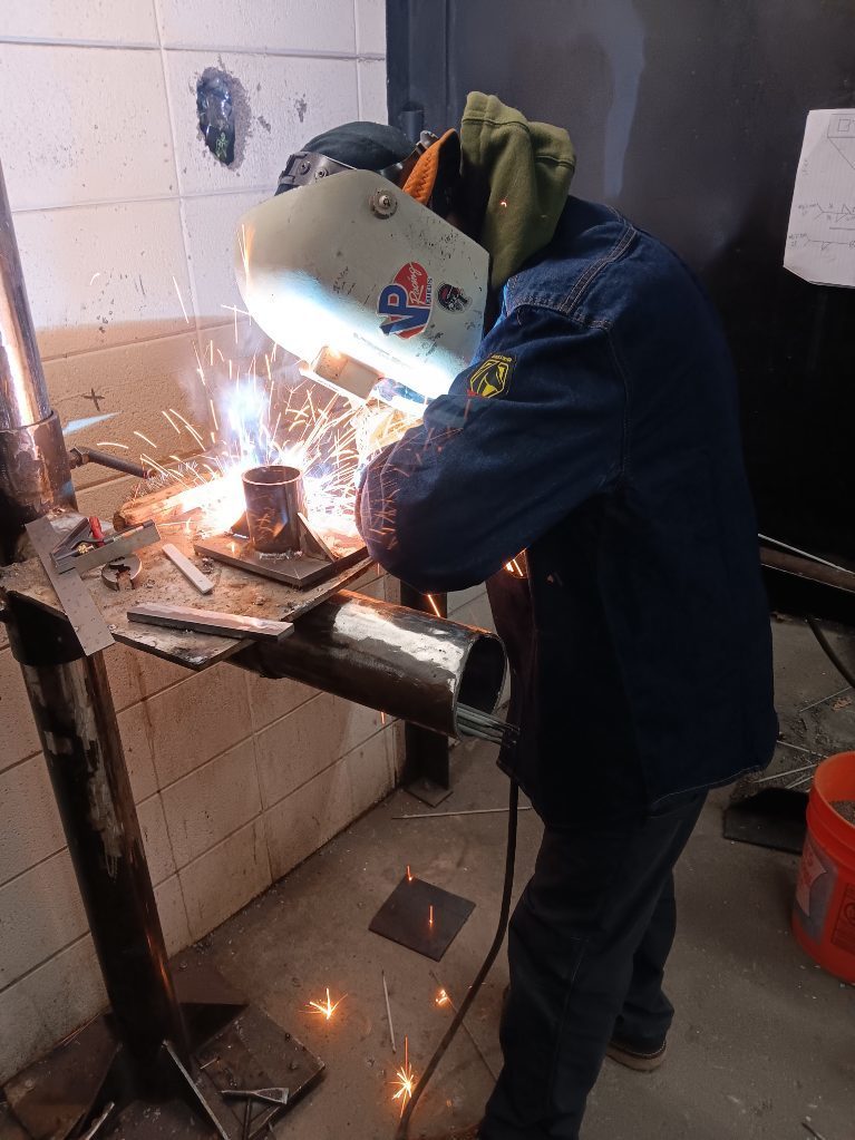 Dustin Hamilton (North Harrison) welding his gussets out with some E6010