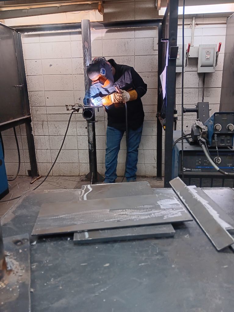 Kreed Taylor (Ridgeway) welds out his gussets with E7018