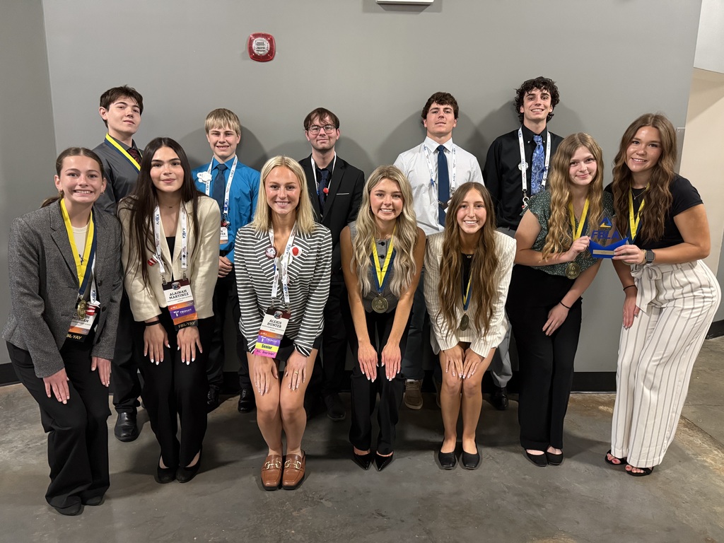 Group photo of South Harrison FBLA students who attended the State FBLA conference. Students are arranged in two rows. Back row, left to right: Rudy Updegraff, Jansen VanMeter, Lane Wedgeworth, Joel McCall, Brody Templeton. Front row, left to right: Corynn Morgan, Alaniah Martinez, Lexi Hunter, Lucy Rainey, Abby Owens, Cally Weller, Karli Forck.