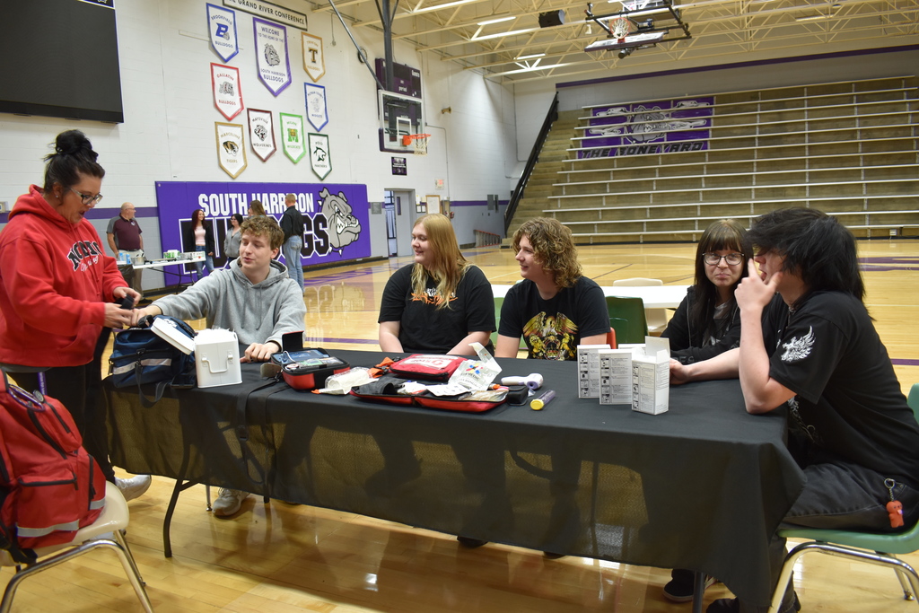 Senior Day at South Harrison; pictured students and Nurse Lorrie demonstrating the use of a tourniquet