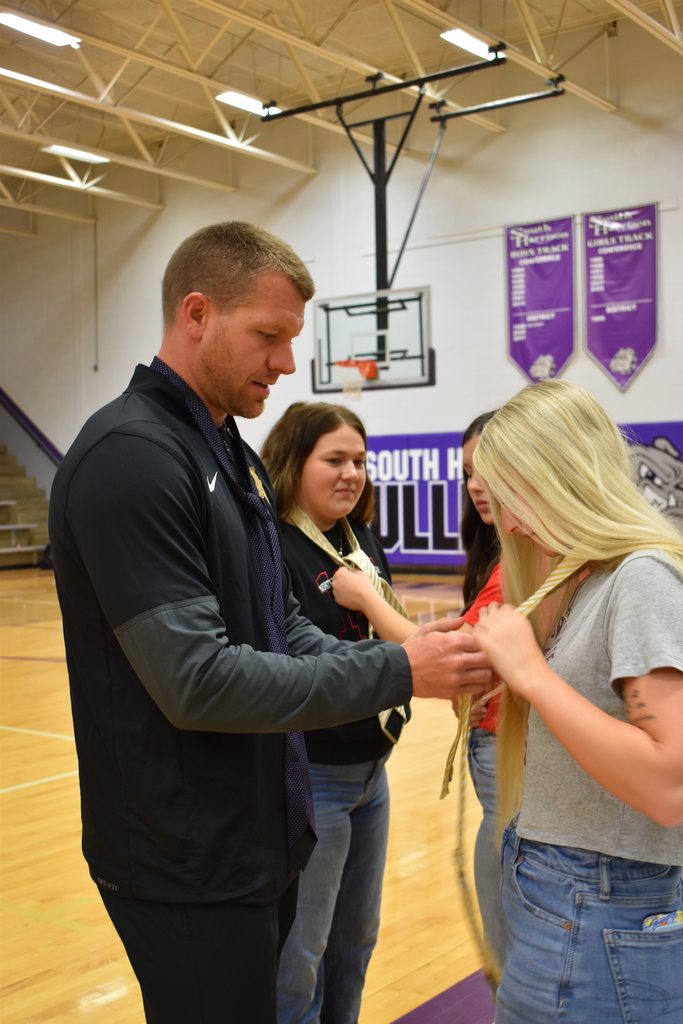 Senior Day at South Harrison; pictured Mr. Watson teaching how to tie and neck tie