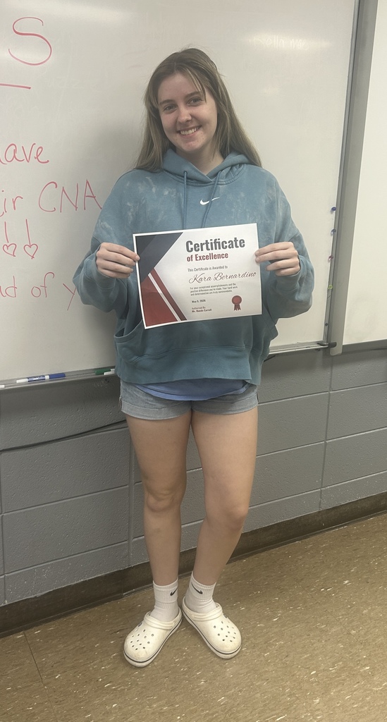 Kara Bernardino holding certificate