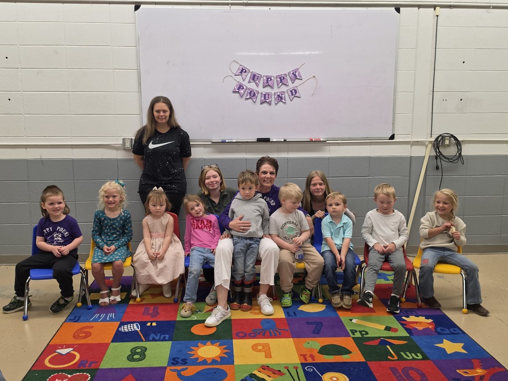 Preschool students sitting together for group pictures and participating in classroom learning activities with classmates and teachers.