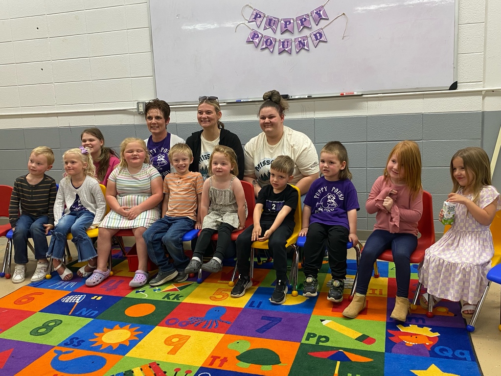 Preschool students sitting together for group pictures and participating in classroom learning activities with classmates and teachers.