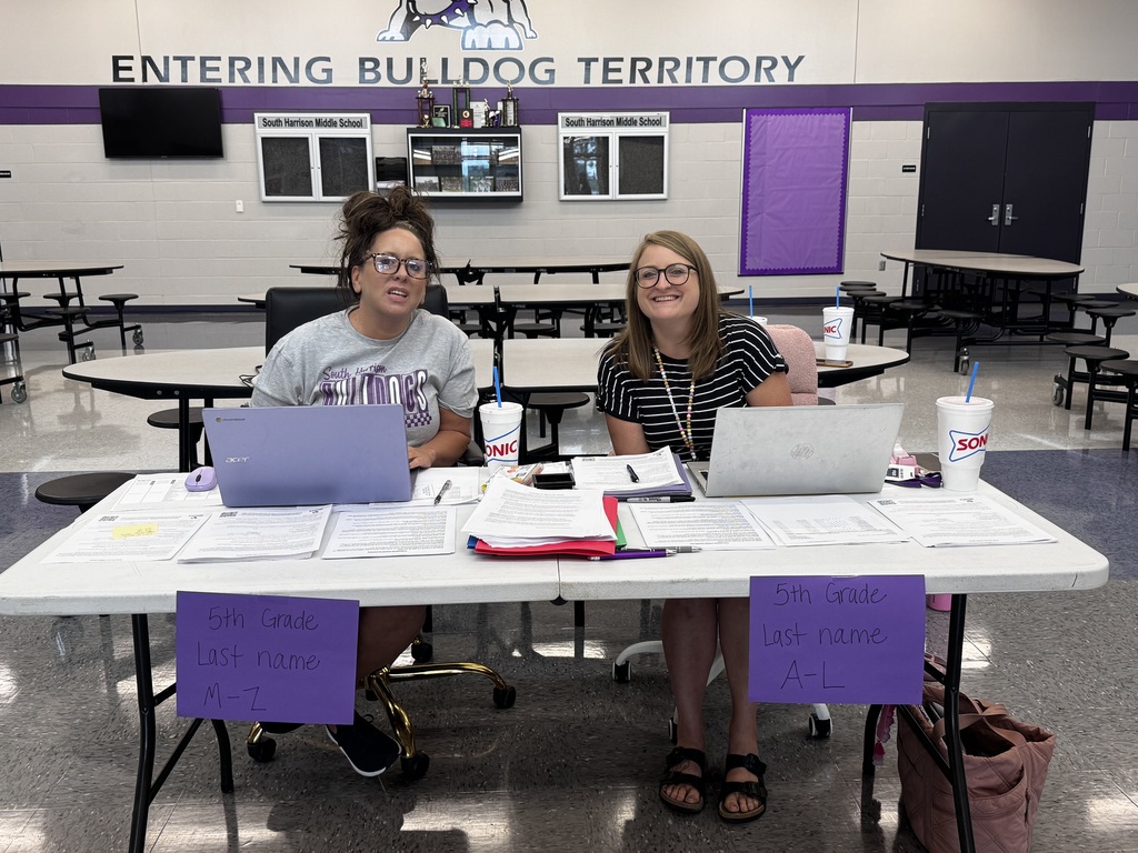 Ms. Wiig and Ms. McConkey welcome students with a smile