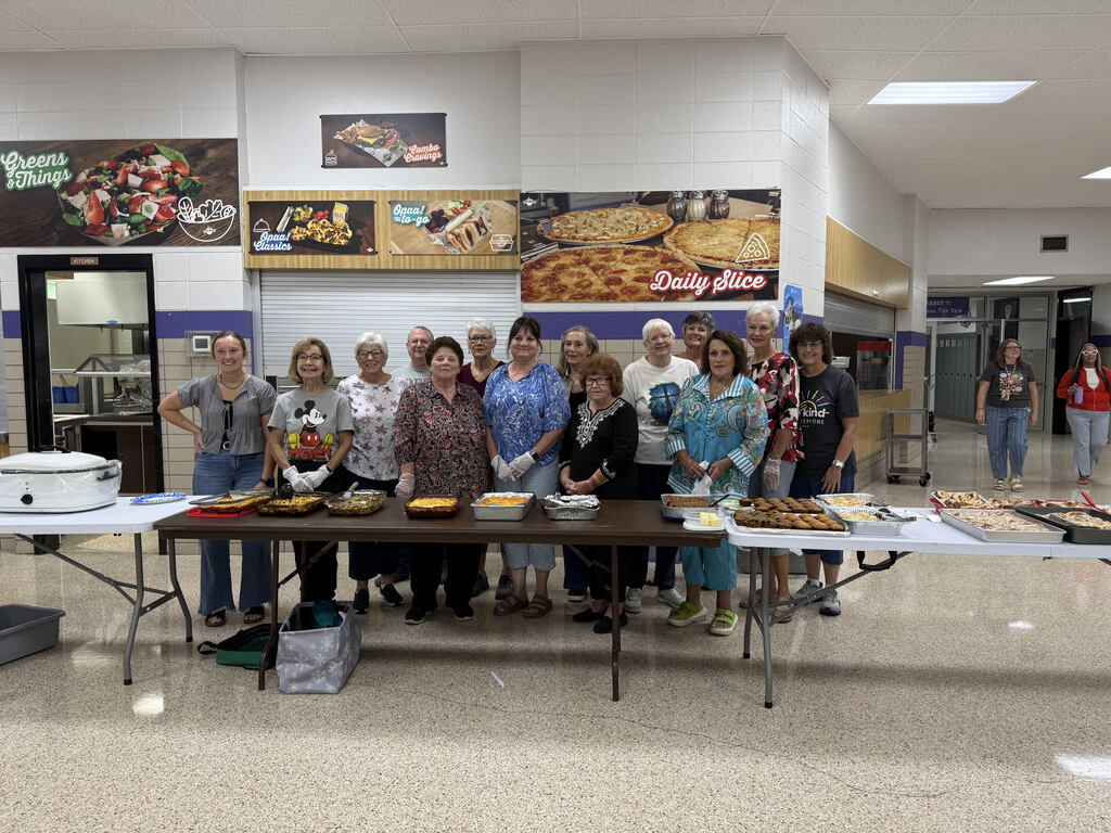 Members of the First Methodist Church serve breakfast
