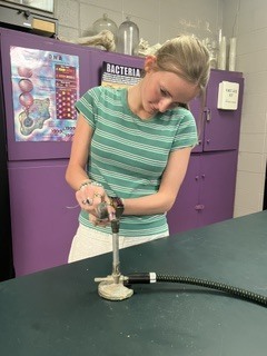 Students are doing a lab mastering the Brunsen Burner