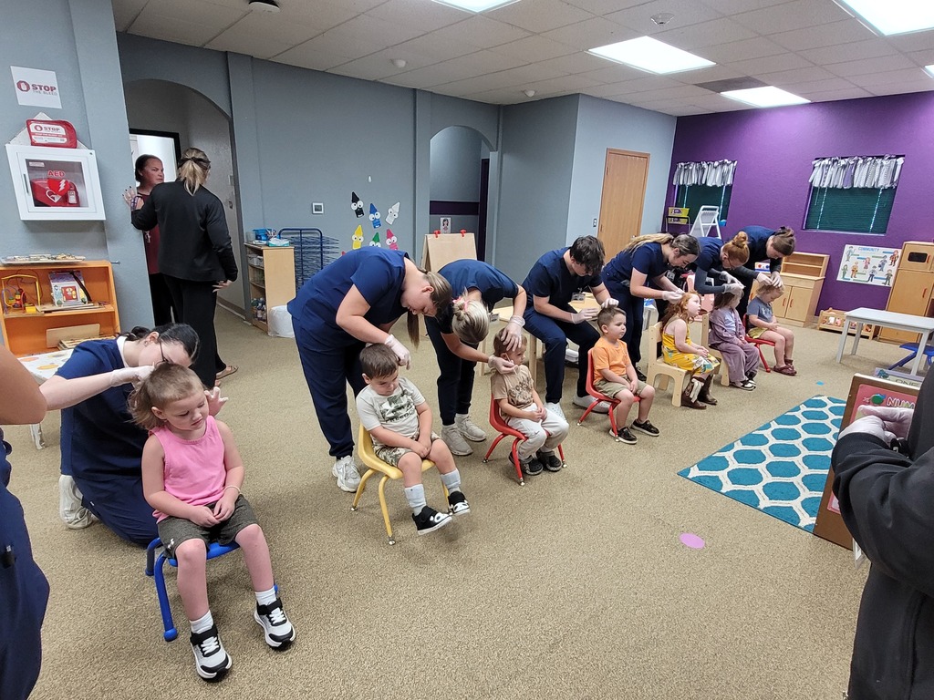 Preschoolers getting lice checks