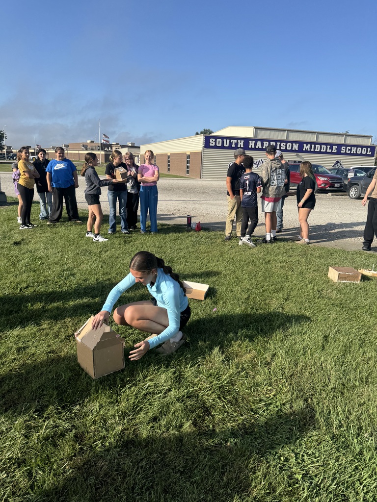 Mr. Bottcher middle school science students designed and built houses they thought could survive hurricane winds and rain. They had to think about the shape of the house, how to keep the roof on and how to protect it from wind and rain. They tested them with a leaf blower and watering cans!