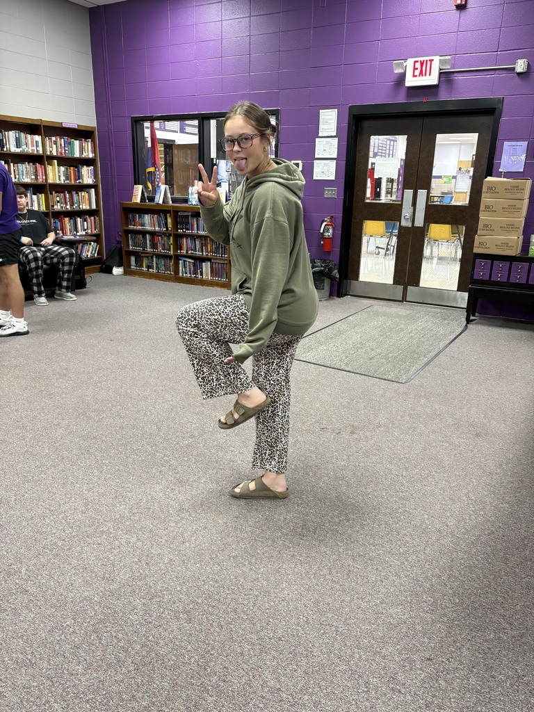 Students wearing Pjs posing for picture