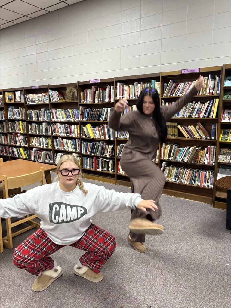 Students wearing Pjs posing for picture