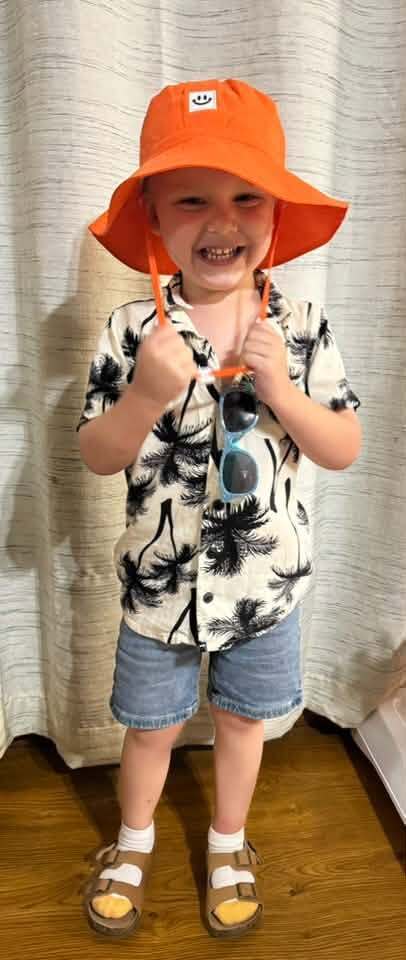 kid in a vacation outfit for homecoming week at school