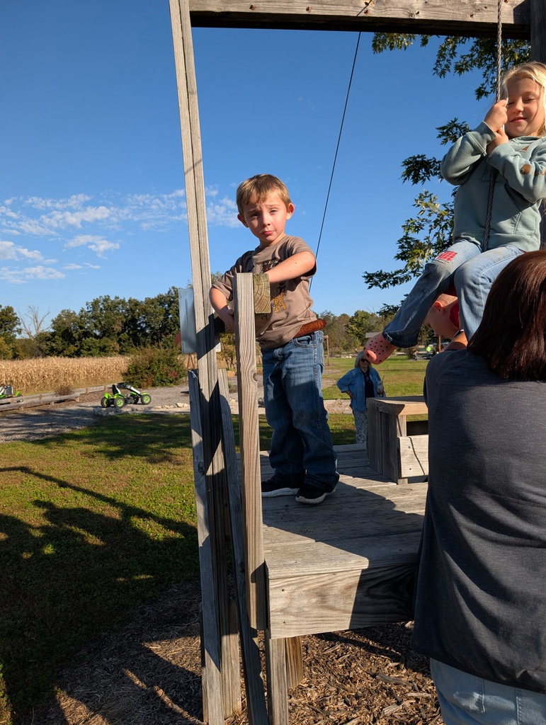 boy on tire swing