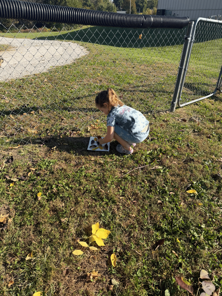 girl leaf hunting