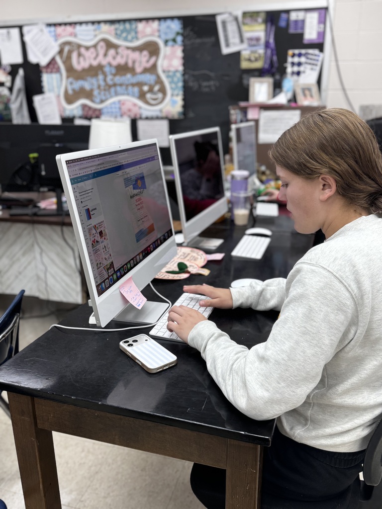 Kenzley Hendren, Early Childhood page working hard on graphics