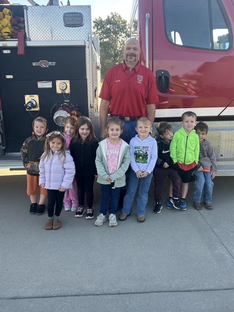 kids infront of fire truck 
