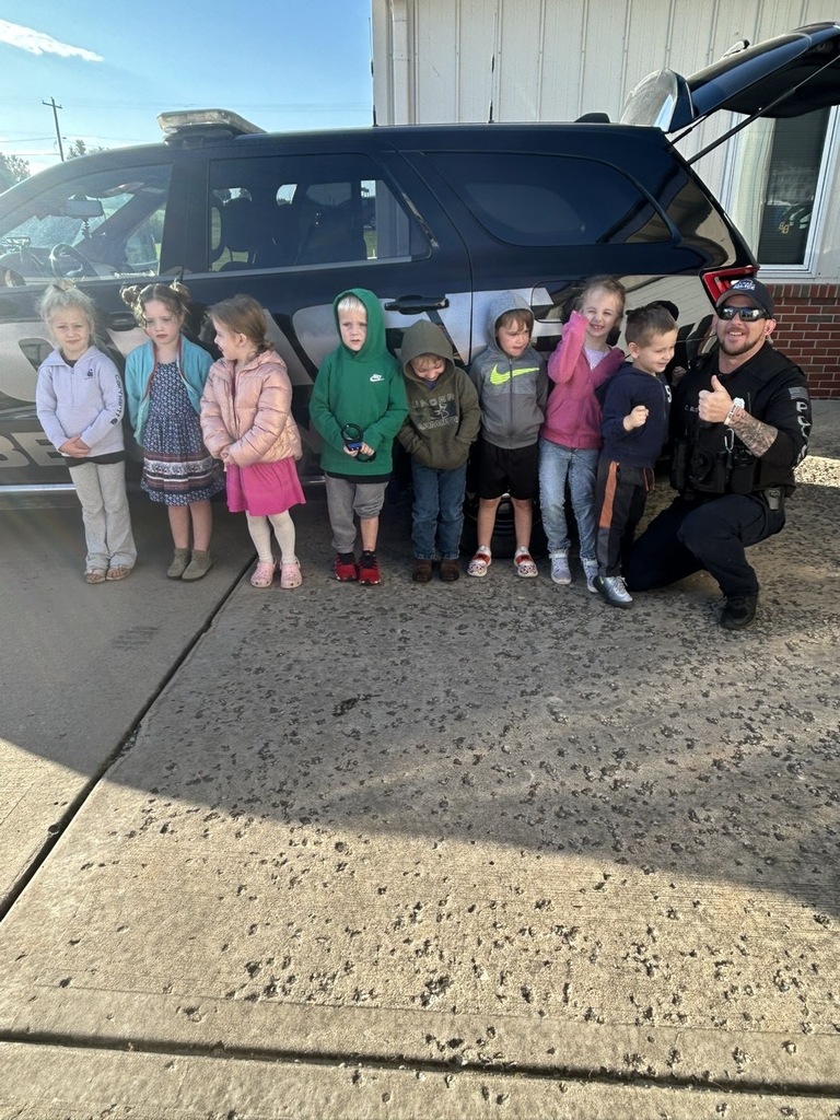Kids infront of cop car
