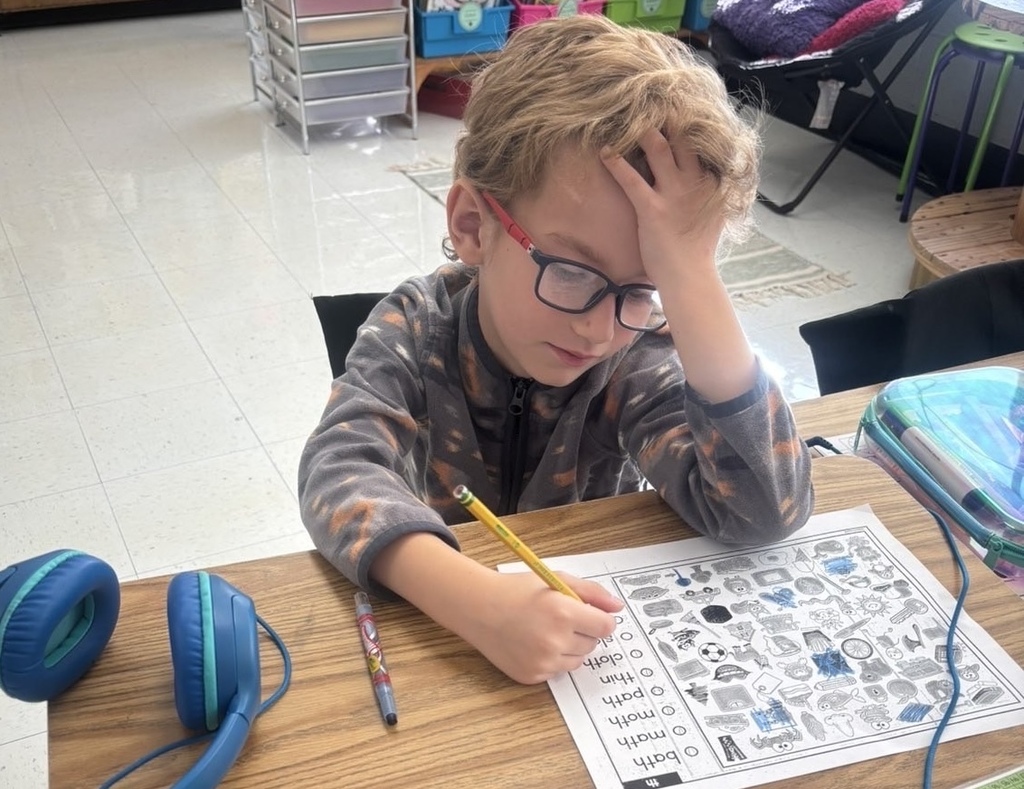 student working individually on his work