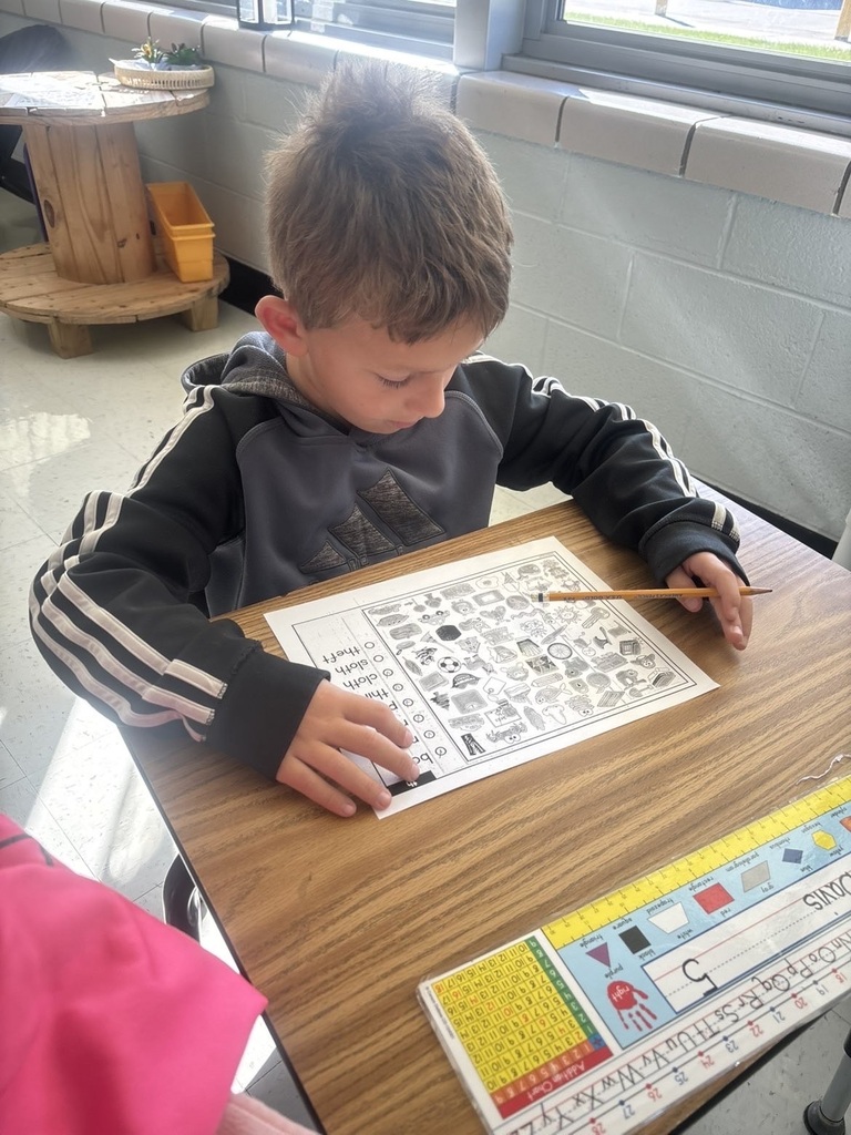 student working indiviually on his work