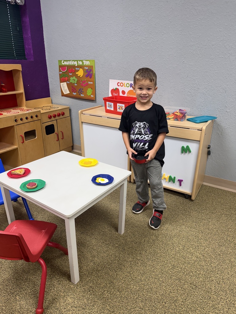 boy placing food on plates