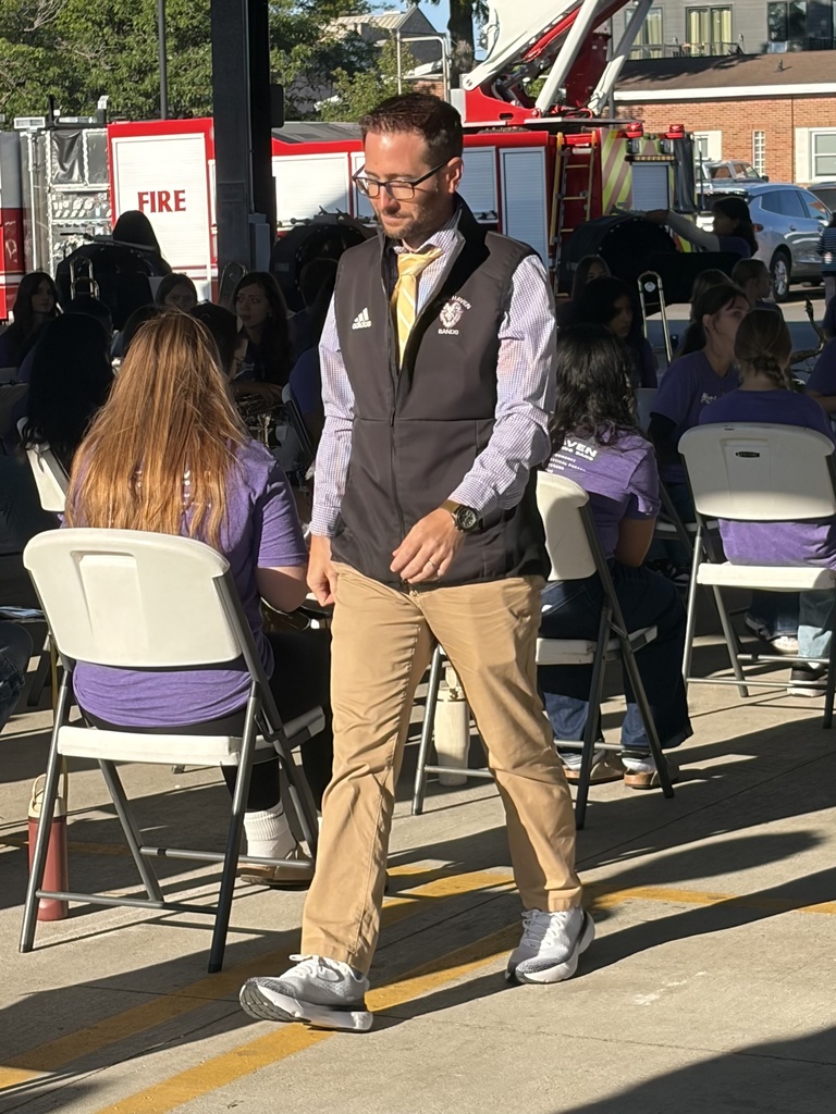 band director walking to conduct