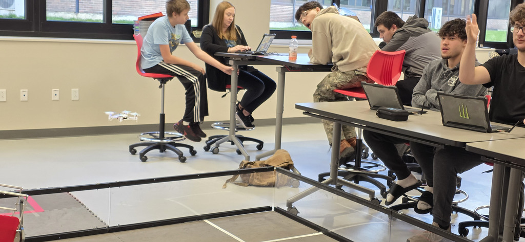 Darrian an Skyler programing the drone