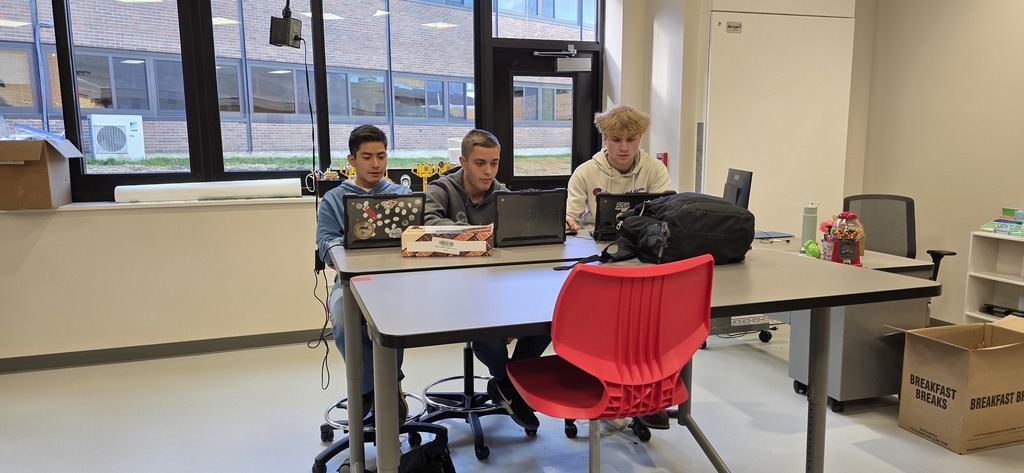 Blake, Mason, and Calvin working on coding