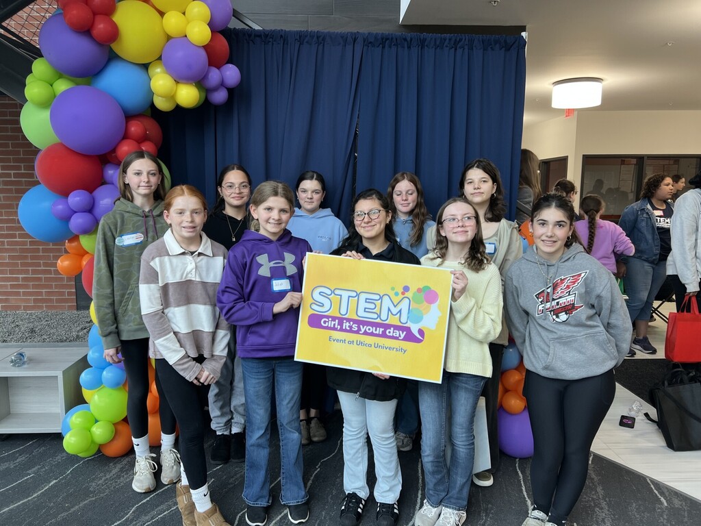 Group pictures of the middle school girls group who attended Girls in Steam Day. 