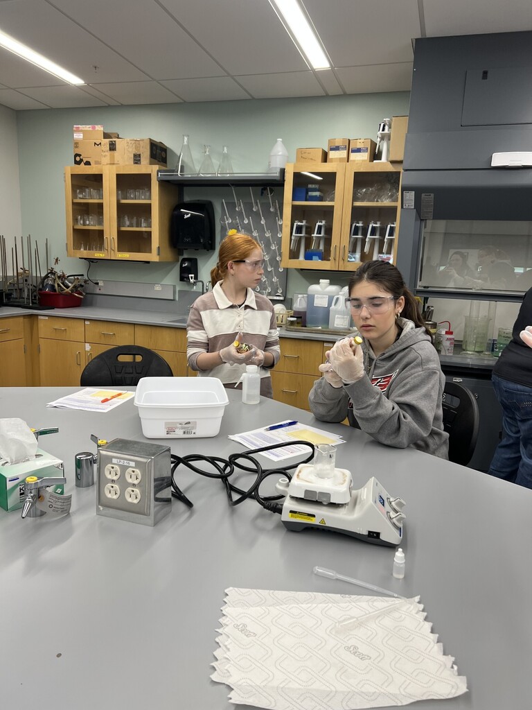 two girls at a lab table