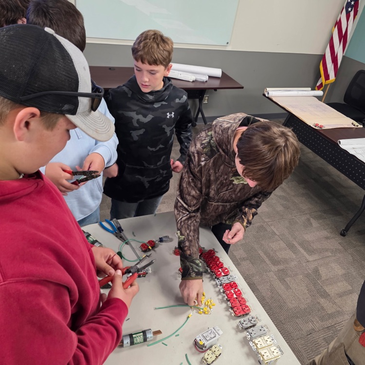 students practicing electrical skills