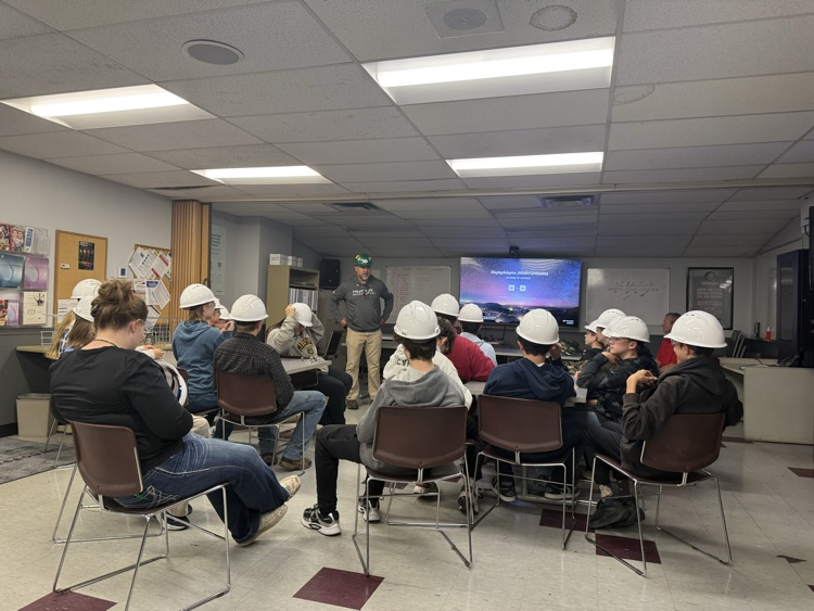 students listening to speaker