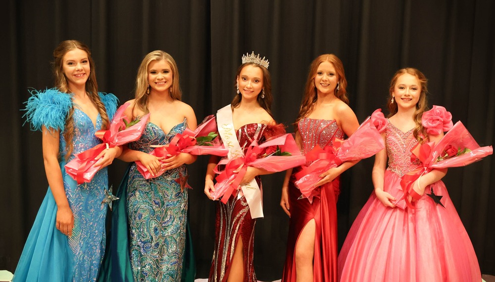 Junior high girls holding flowers