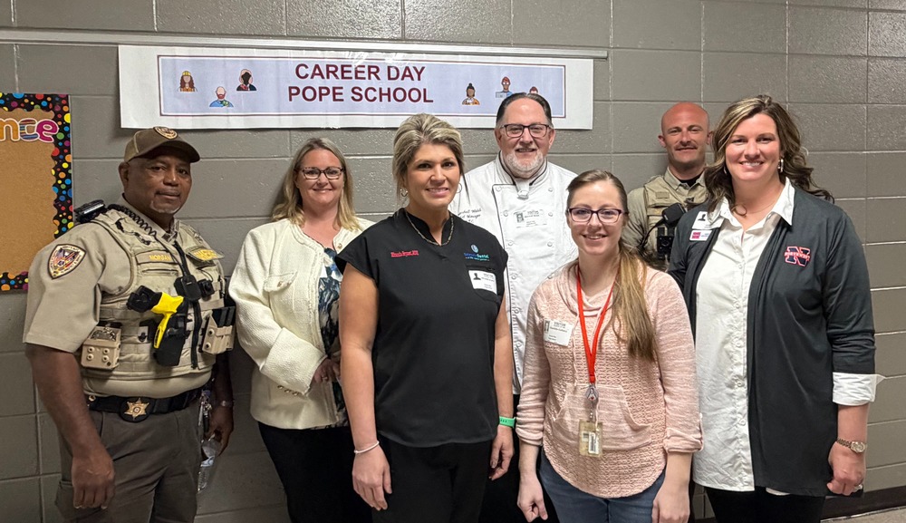 group of professionals standing in a group