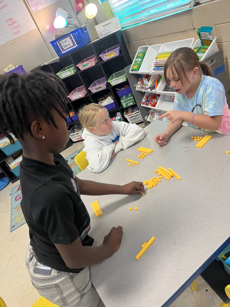 2nd grade students using manipulatives