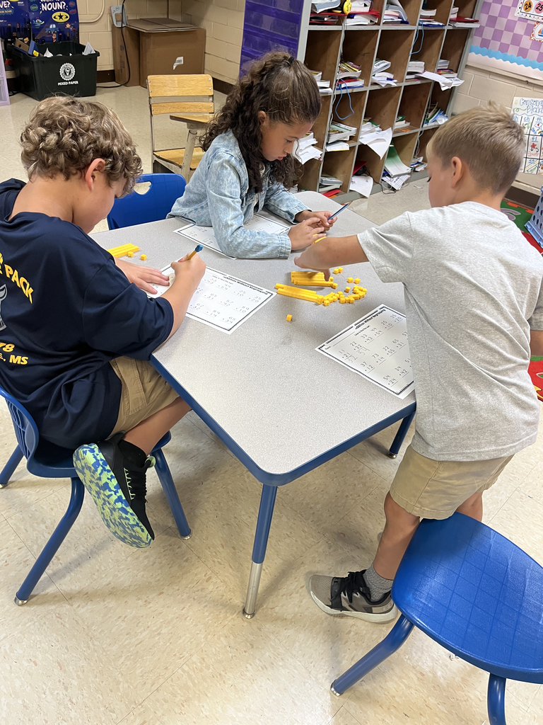 2nd grade students using manipulatives