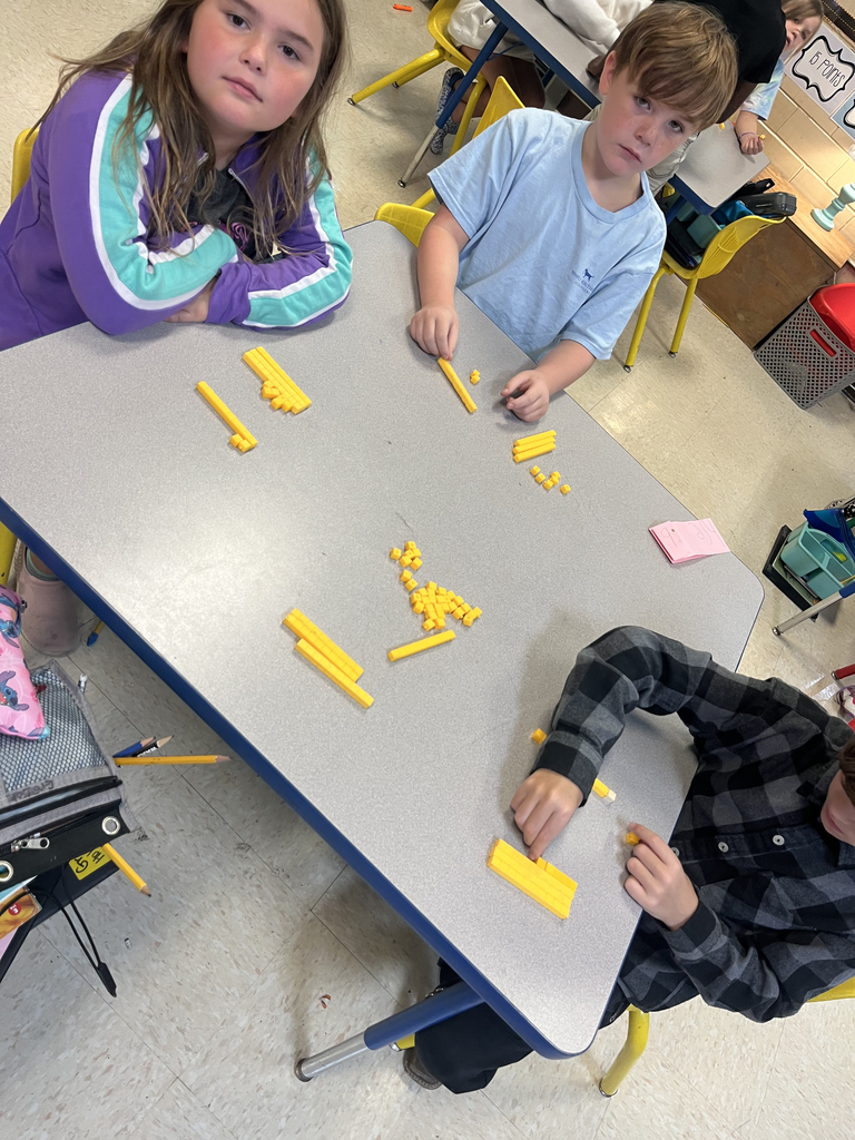 2nd grade students using manipulatives